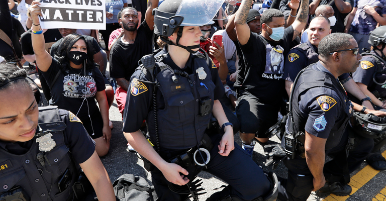 police kneel during Black Lives Matter protest